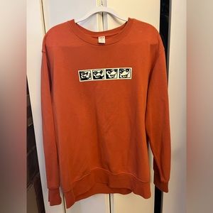 Uniqlo x Keith Haring x Mickey Mouse orange sweatshirt